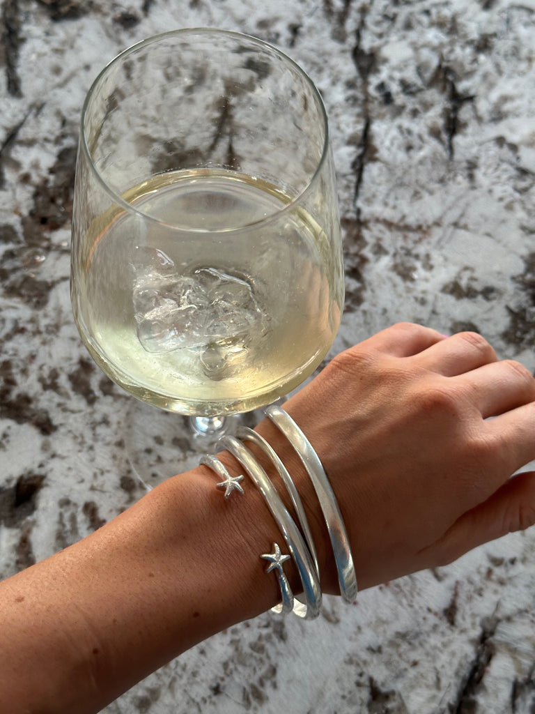 Bold and beachy starfish bangle from Alula Collections Jewellery, designed in the UK.