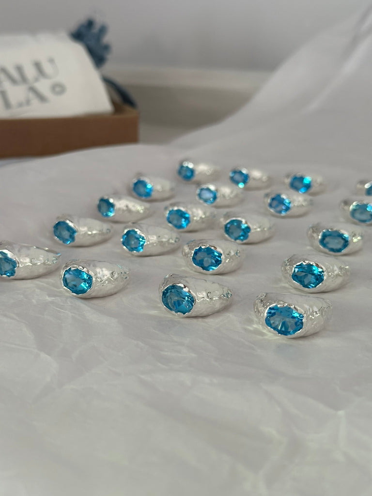 Bold statement gemstone ring with 4ct blue topaz in sterling silver, made by Alula Collections.