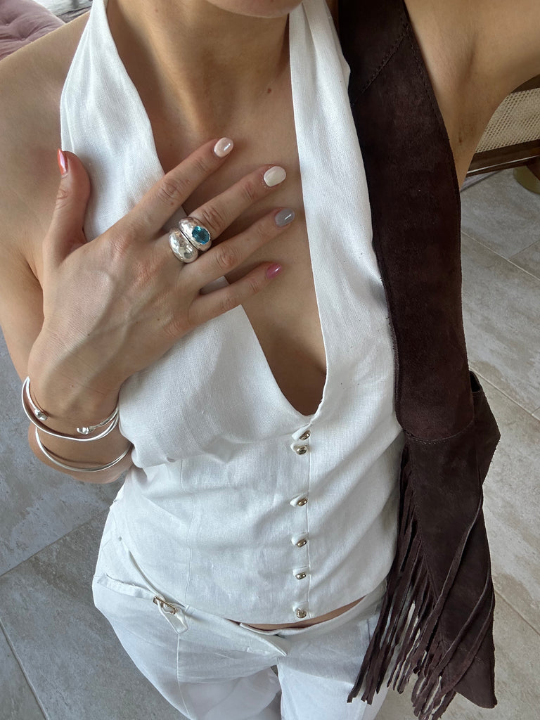 Chunky sterling silver ring with oval-cut Swiss Blue Topaz by Alula Collections
