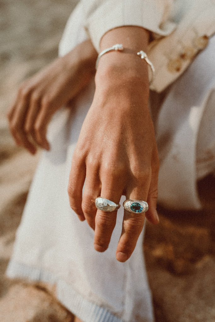 Handmade 925 sterling silver ring with 4ct Swiss Blue Topaz by Alula Collections.