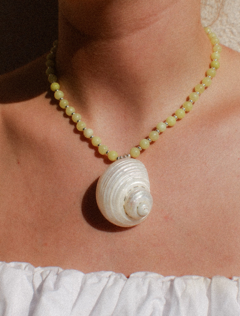 Twirley Whirley shell necklace in Lime Fizz with jade beads and sterling silver, handmade in Salcombe, Devon by Alula Collections Jewellery.